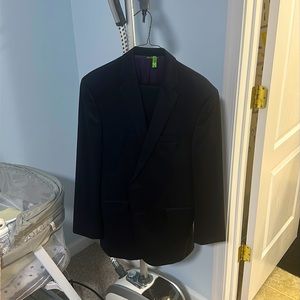 Barney’s New York Navy Suit. Italian Wool by Loro Piana. 40R Jacket. Pants 34R.